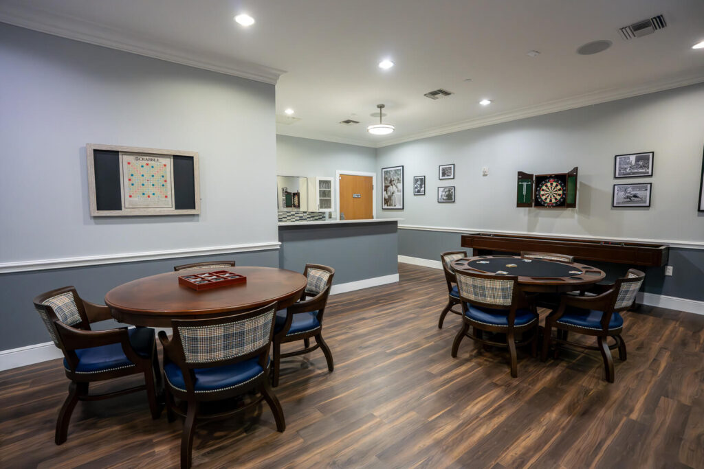 Indoor Game Room with Card Tables at Memory Care Homes
